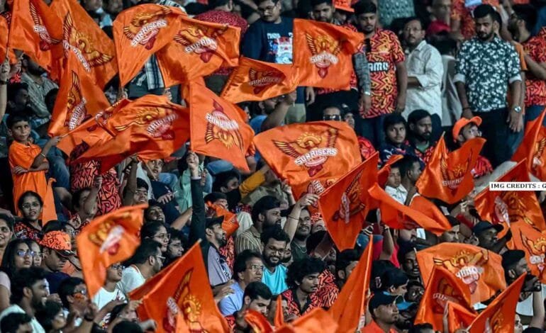 Supporters waving orange and red flags ahead of SRH vs PBKS showdown