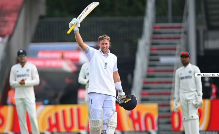 Joe Root raises his bat after reaching another Test century at Old Trafford